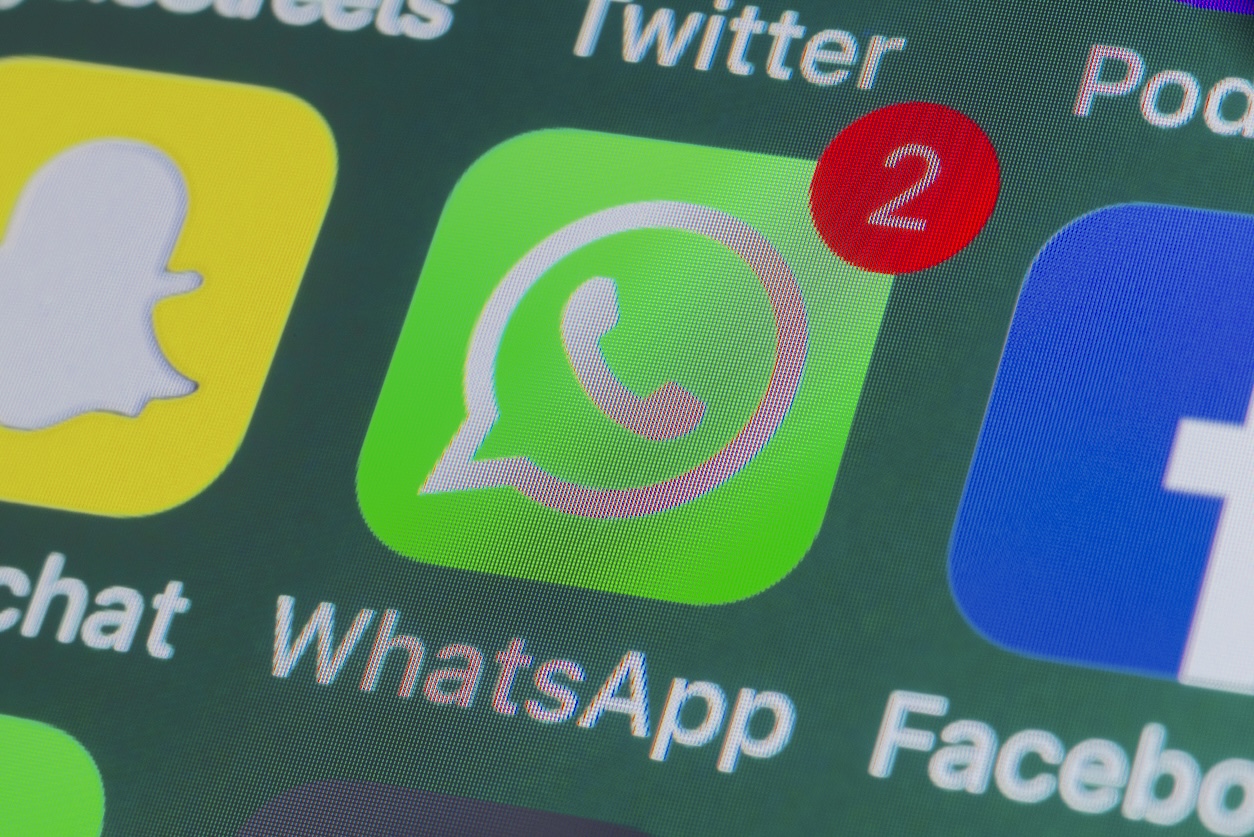 Side-by-side comparison of Android and iPhone settings screens showing notification permission options for WhatsApp